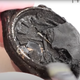 Imagen para el artículo titulado Esta restauración de un reloj Omega Seamaster destrozado en un incendio te dará tres minutos de paz